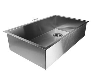 Stainless steel under mount sink with a right rear drain placement.