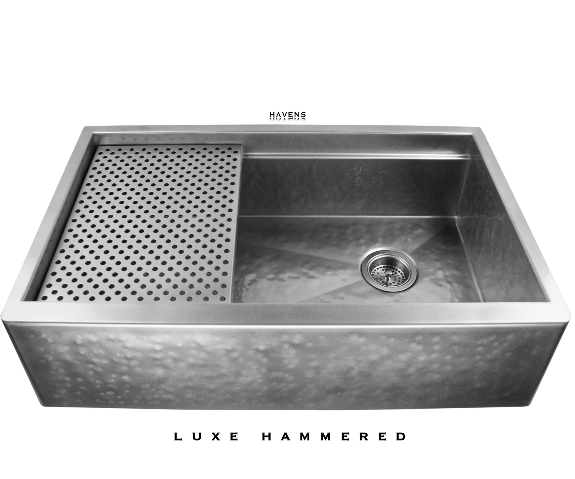 Matte hammered stainless steel farmhouse sink with a rustic appearance. Culinary workstation style sink with a built in ledge for accessories. 